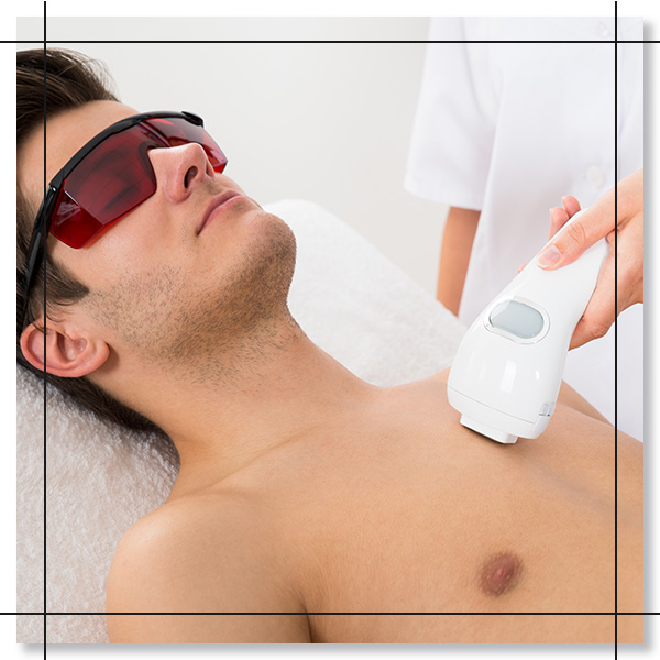 Side 1 man getting laser hiar removal on his chest